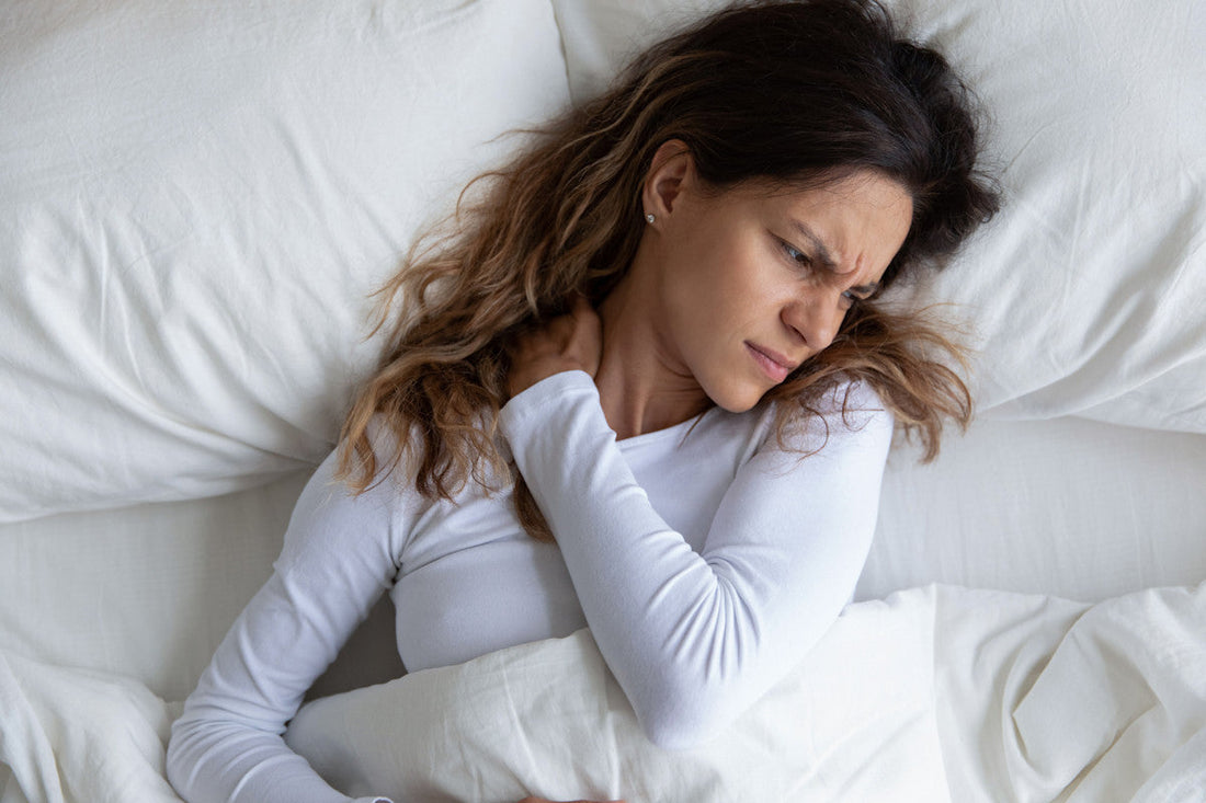 Person sleeping with neck pain